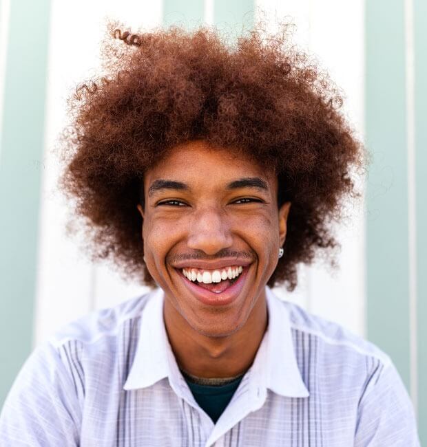 A smiling male patient of Viva Dental Group Orangeville
