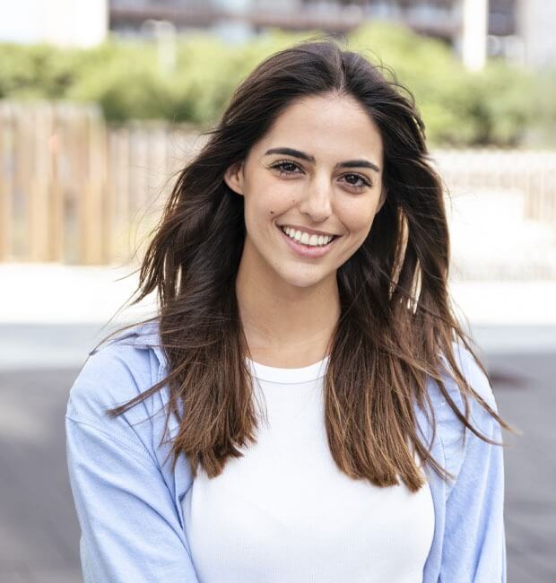 Smiling Viva Dental Orangeville patient with new dental veneers