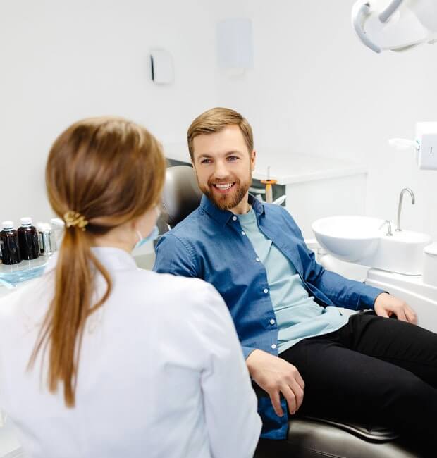 Dentist explaining the sedation procedure to her patient