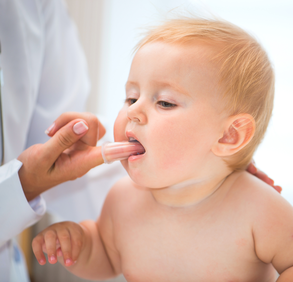 examining-baby-teeth